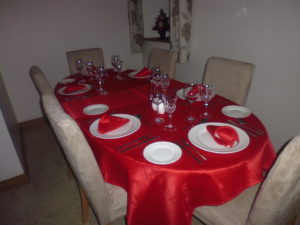 The dining table set for Christmas dinner at Brystone